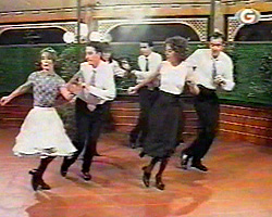faux y sus alumnos bailando swing en el programa 'Queridos vecinos' de TeleGijón en 1998
